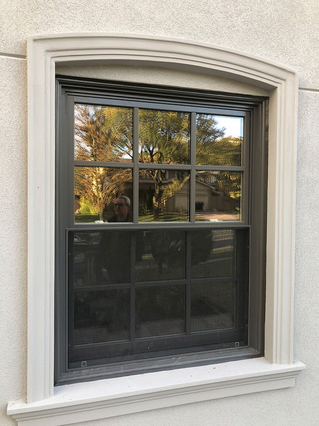A bedroom window replaced with a new window on a Toronto home