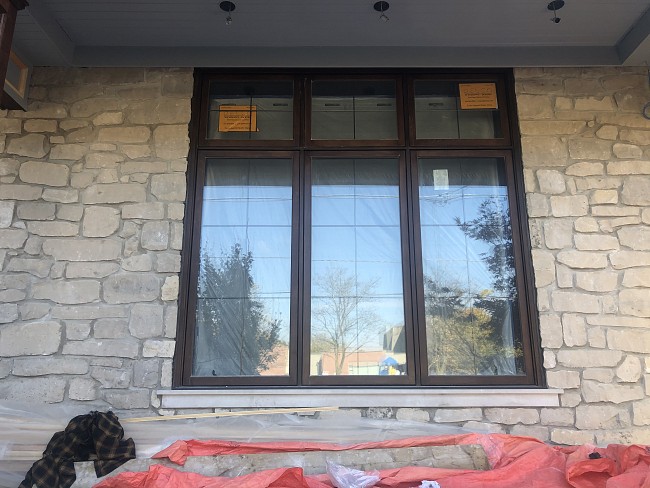large living room wood window front