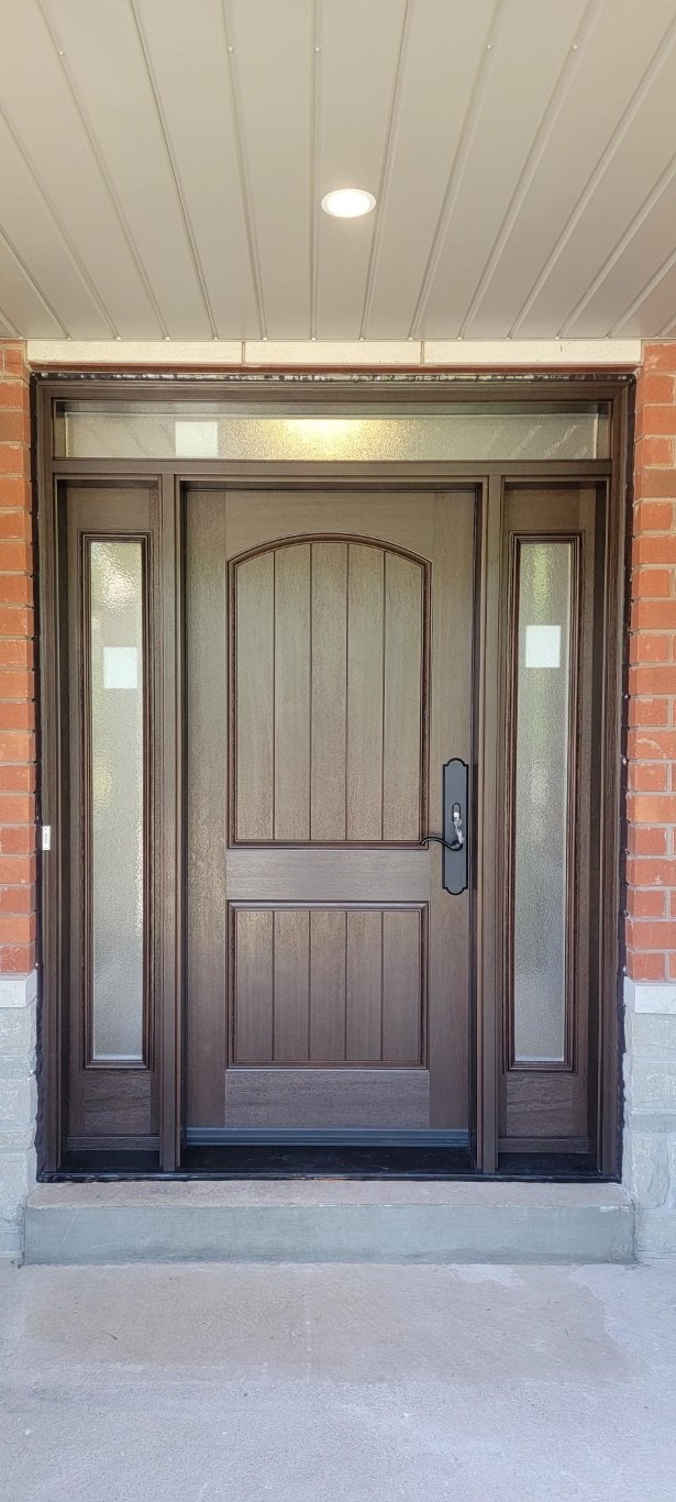 classic fiberglass entry door with transom window and sidelights