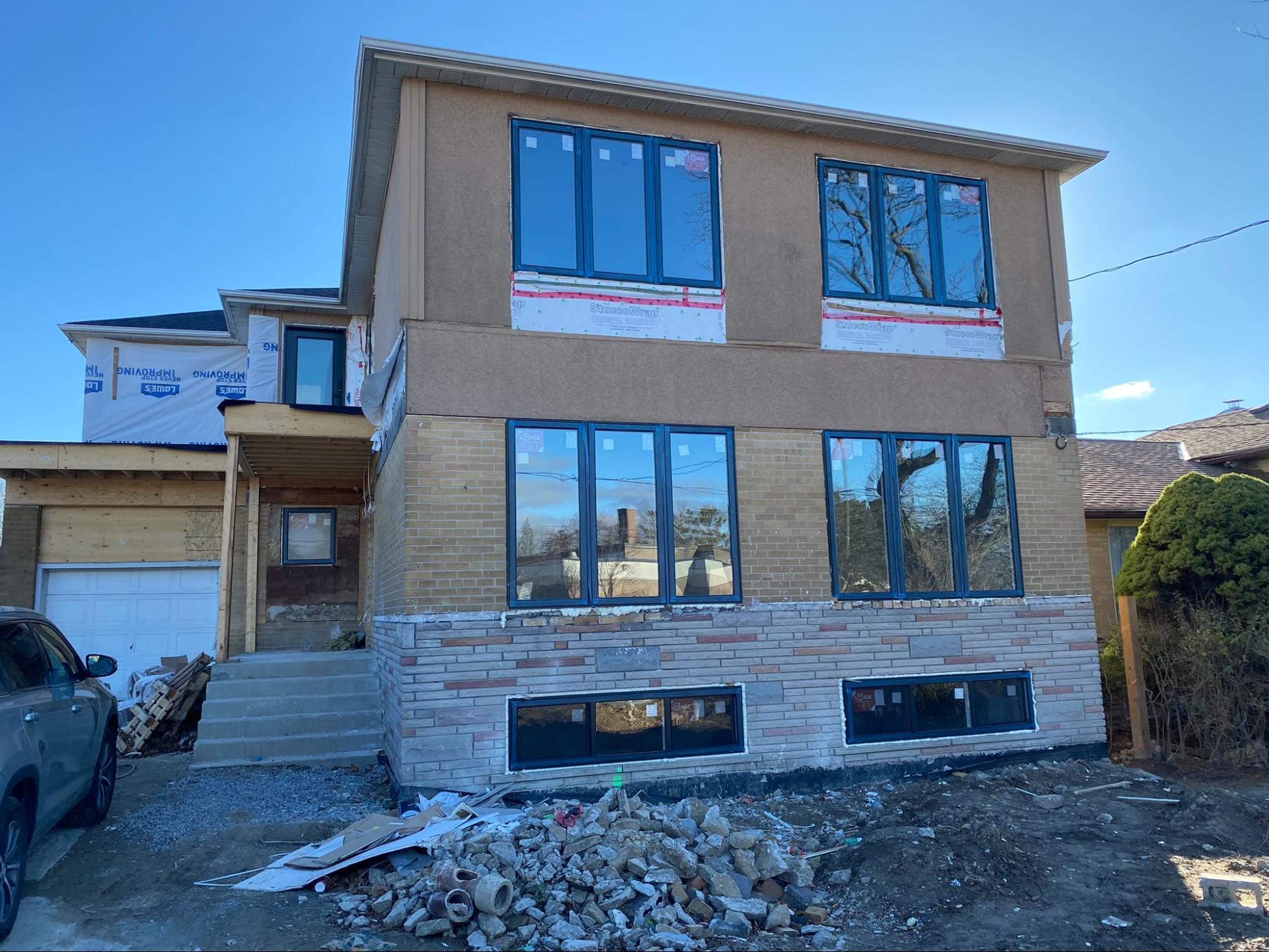 Residential new window installation improving energy efficiency in a Toronto home