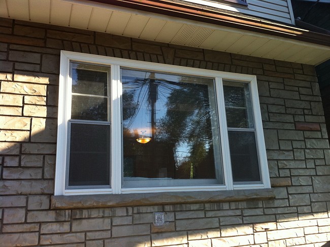 older house in Toronto with new bedroom replacement window 