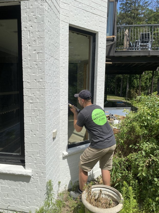 window installer replacing a window on home in Toronto Canada